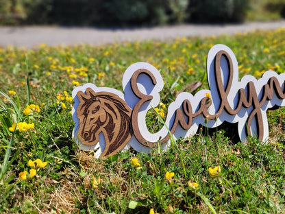 Close-up of laser engraving on personalised girls bedroom sign – handmade in Devon UK