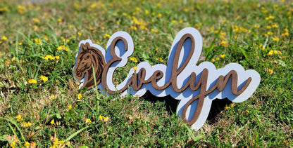Girls bedroom name sign in situ on door – personalised laser engraved plaque handmade in Devon