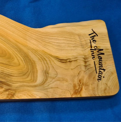 Personalised cedar serving board alternate angle showing live edge timber – handmade in Devon UK