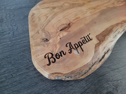 Close-up of laser engraving on personalised hardwood serving board – Moon Groves Devon UK