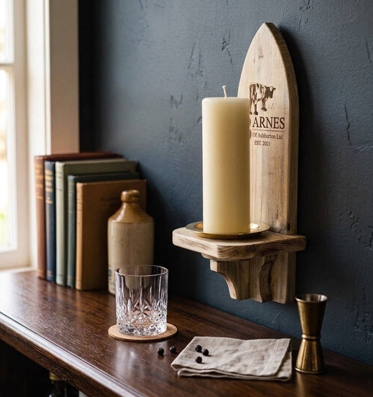 Wooden gothic-arch wall candle sconce in a Devon interior, handmade in Ivybridge