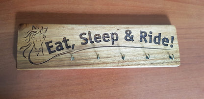 Close-up of horse design on personalised keyring hanger – laser engraved handmade in Devon UK