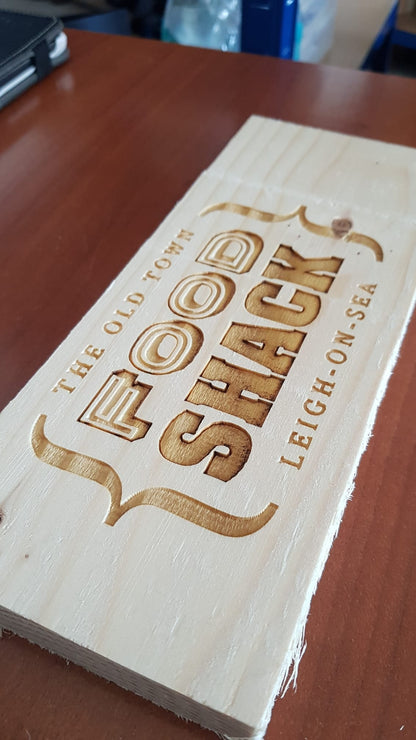 Bespoke custom laser engraved logo sign on wood – business branding by Moon Groves, Devon UK