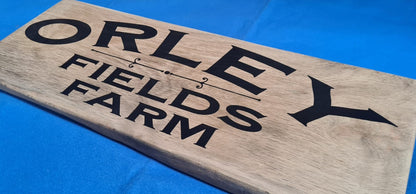 Bespoke custom laser engraved logo sign on wood – business branding by Moon Groves, Devon UK